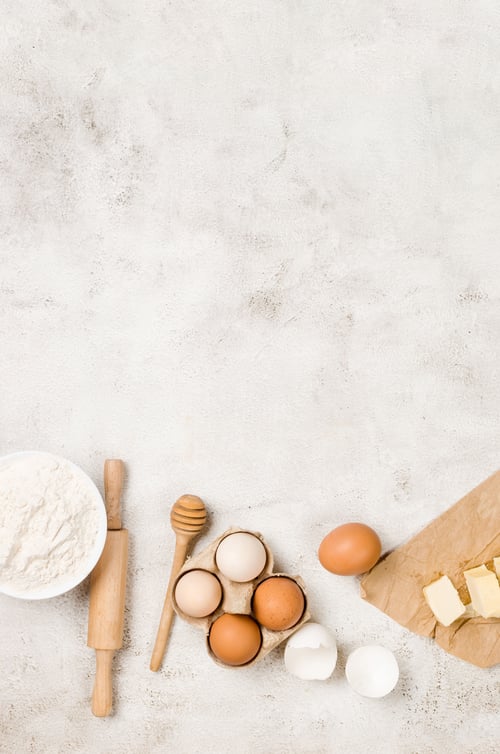 Preview: Ingredients for making dough dishes: cakes, cookies, muffins, pies on a gray background.