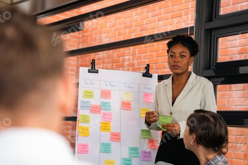 Preview: mature caucasian ceo businessman leader with diverse coworkers team executive managers group meeting