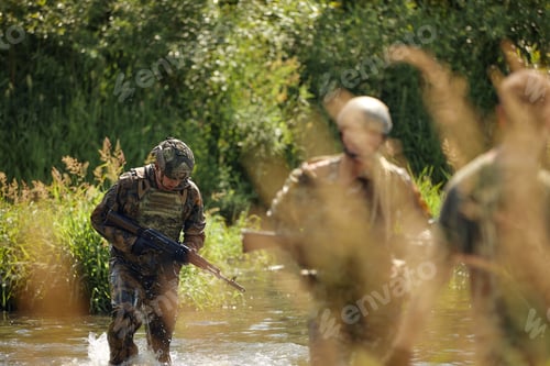 Preview: Full military experience - One day commando - running through the water with automatic rifle replica
