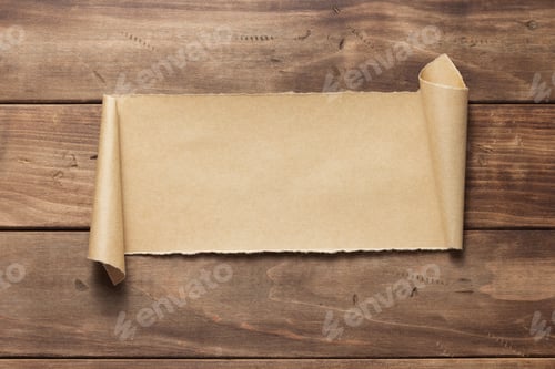Preview: curved or scrolled paper on wooden background