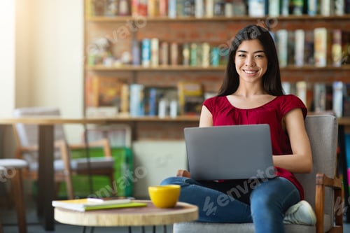 Preview: Mobile Office. Cheerful Asian Female Freelancer Sitting With Laptop In Cafe