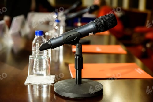Preview: Microphone in conference room to communicate to the audience a business speech.