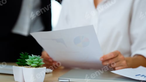Preview: Business officer brainstorming and talking in office
