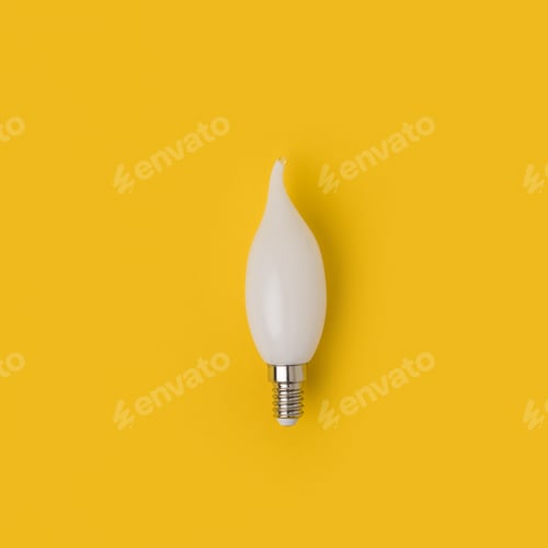 Preview: close up view of white light bulb isolated on yellow
