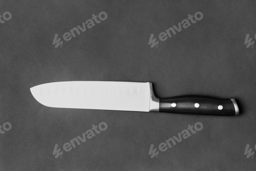 Preview: Large kitchen knife on a black background