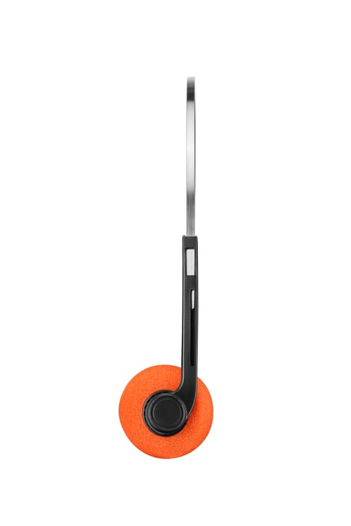 Preview: 80s vintage headphones with orange pads isolated on white.
