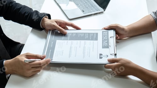 Preview: Businessman interviewer consider a resume conversation during about profile of candidate