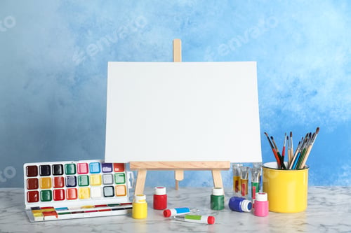 Preview: Painting Supplies on a Table with Blue Background