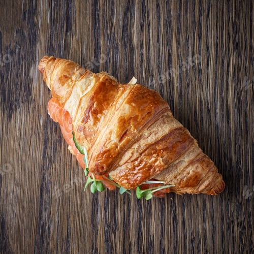 Preview: Fresh croissant with salmon and greens