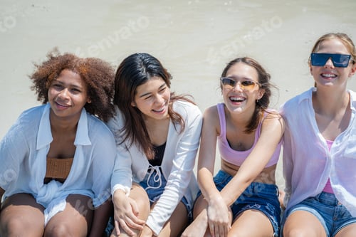 Preview: Group of happy friends having fun at ocean beach,Summer vacation.