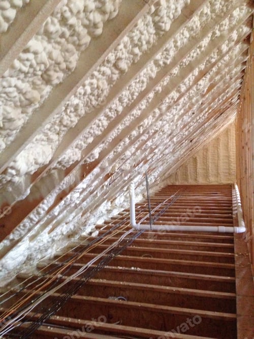 Preview: New house or home attic rafters with spray insulation for energy conservation