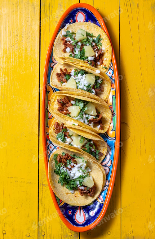 Preview: Mexican background with tacos al pastor and mexican sauces.