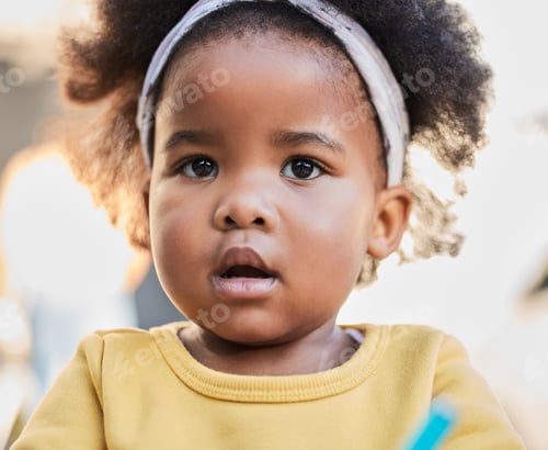Preview: Embrace your younger years. Shot of a little girl playing in a garden.