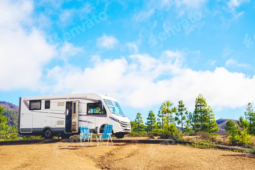 Preview: Beautiful tourism camper van campsite in the nature. Travel and rv renting vehicle vacation