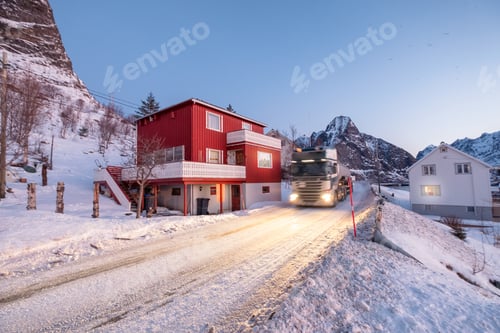 Preview: Truck cargo driving on snowy road in valley