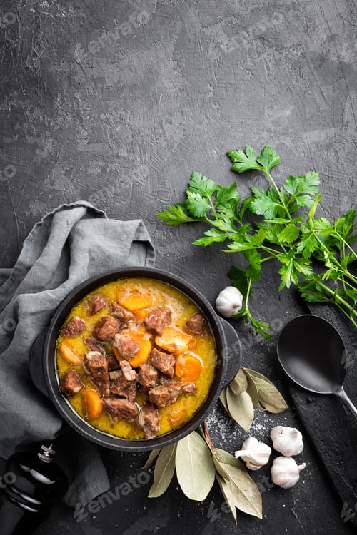 Preview: Meat stew, goulash in a cast iron pot, top view