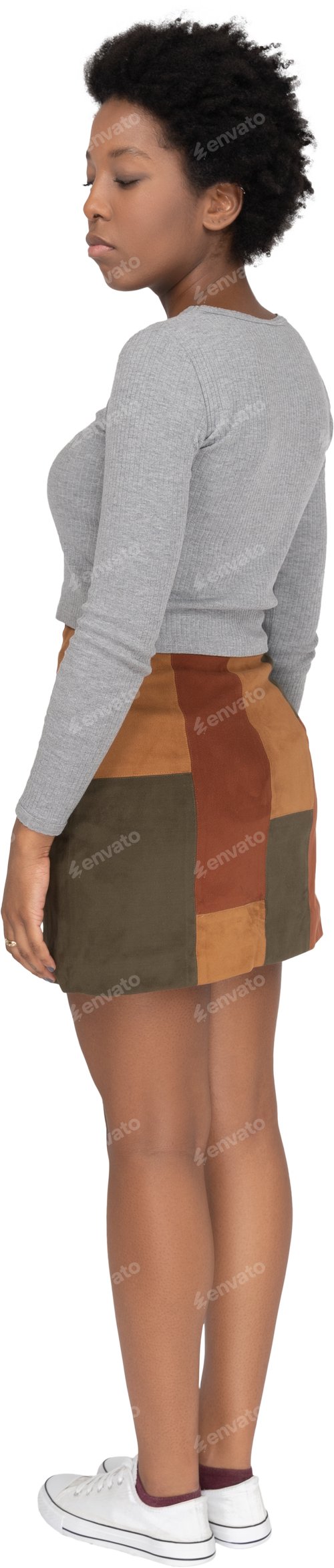 Preview: a mannequin wearing a skirt and a gray sweater