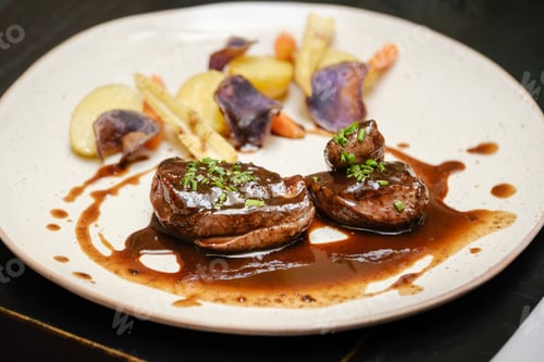 Preview: Appetizing beef steak with assorted vegetables and sauce