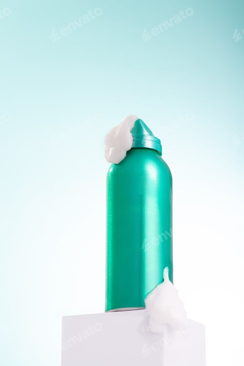 Preview: Cosmetic foam bottle on blue