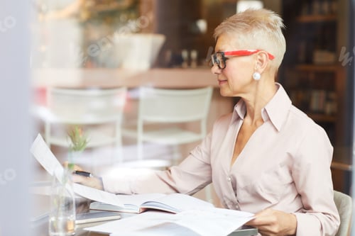 Preview: Woman doing paperwork