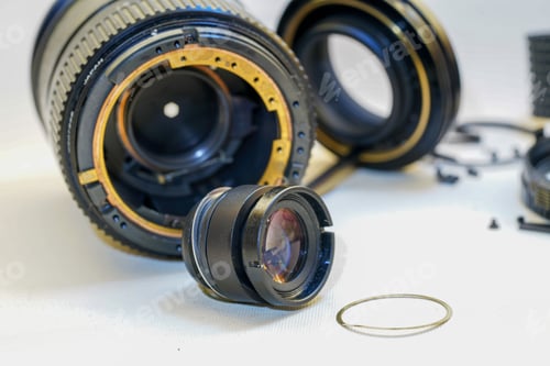 Preview: Closeup of camera lens details. Photographic objective.