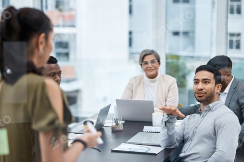 Preview: Shot of a group of businesspeople having a meeting in an office