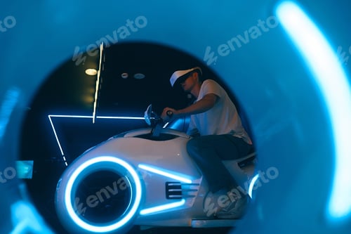 Preview: The player is playing cyber motorcycle racing in vr glasses.