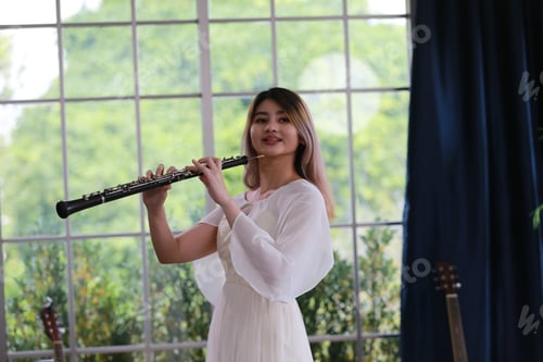 Preview: classic musical song student are learning to play a music instrument in sound studio musician class