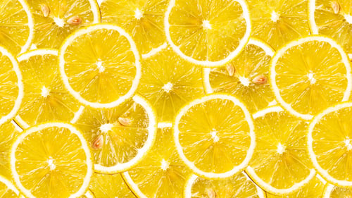 Preview: Organic lemon fruit slices natural juicy background