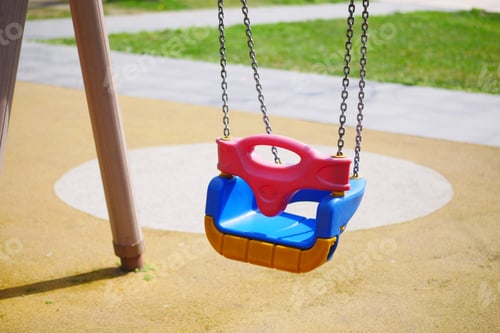 Preview: Close-up of a baby swing in the playground