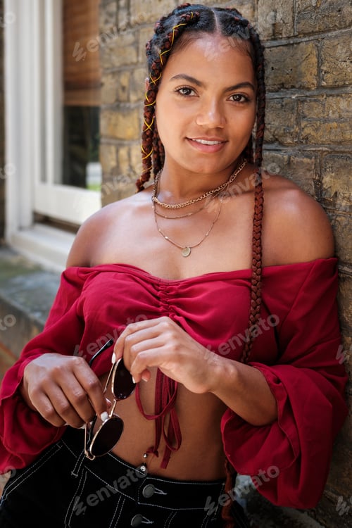 Preview: Young woman with cool hair posing.