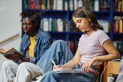 Preview: Teen Girl Studying in Library