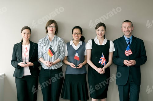 Preview: A business group holding flags