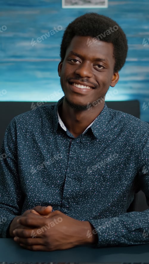 Preview: Portrait of handsome african american man looking into camera