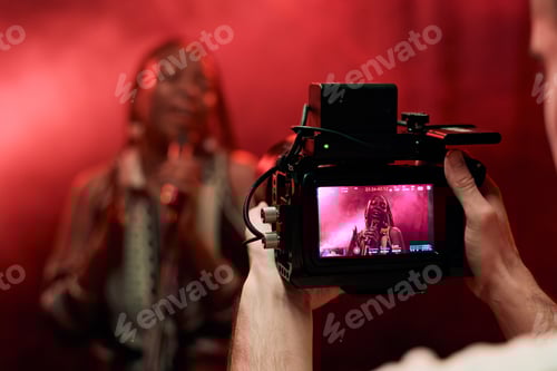 Visualização: Cinegrafista filmando vídeo musical