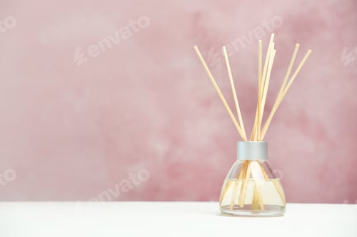 Preview: Aromatic reed freshener on table against color background