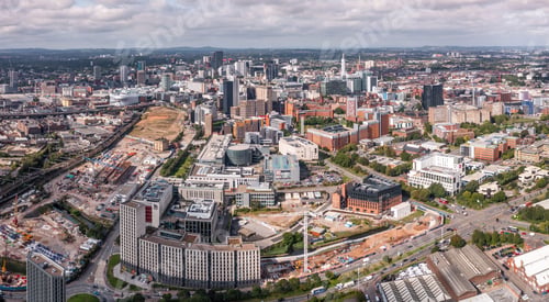 Preview: Aerial view of a Birmingham cityscape skyline with HS2 construction site