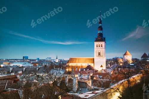 Preview: Tallinn, Estonia. Night Starry Sky Above Traditional Old Architecture Skyline In Old Town. St