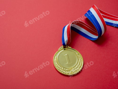 Preview: Gold medal. Champion trophy award and ribbon. Prize in sport for winner isolated on red background