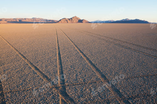 Preview: Tyre marks and tracks in the playa salt pan surface of Black Rock Desert, Nevada.