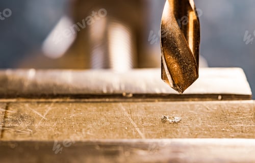 Preview: Drill close-up at the workplace in workshop