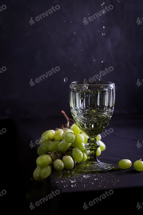 Preview: Still life with wine, grapes and old style glass