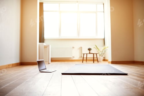 Preview: Bright Sunny Room with Laptop and Yoga Mat