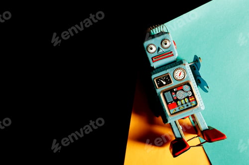 Preview: Vintage robot tin toy on pink background