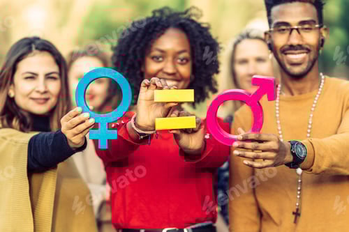 Preview: a woman and a man hold the feminine and masculine signs