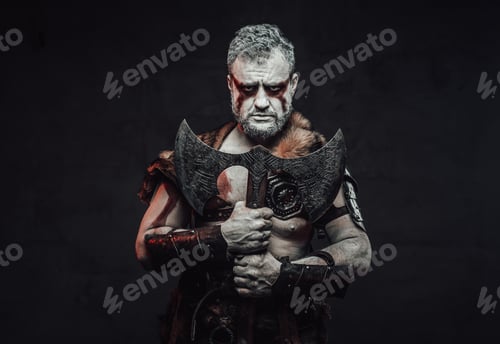 Preview: Savage warrior from the past with his axe in dark background
