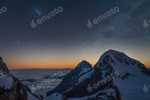 Preview: Morning fog over the Berner Oberland, view from the top of Jungfrau, Alps, Canton Bern, Switzerland