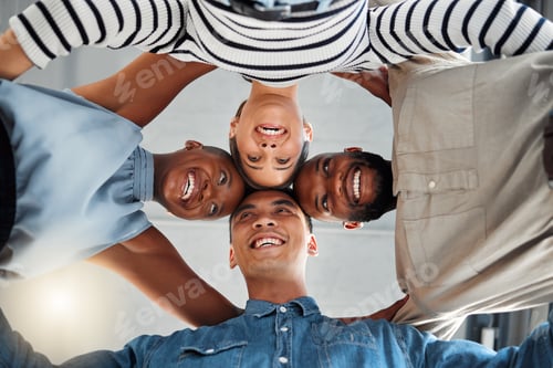 Preview: Group of young diverse businesspeople smiling and huddling in support at work. Joyful colleagues st