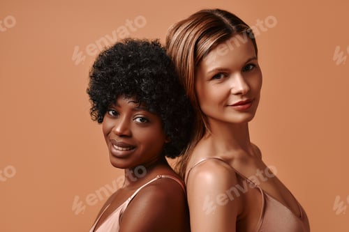 Preview: Multiethnic women on beige background
