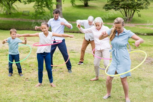 Preview: Multi-generation family playing with hula hoop